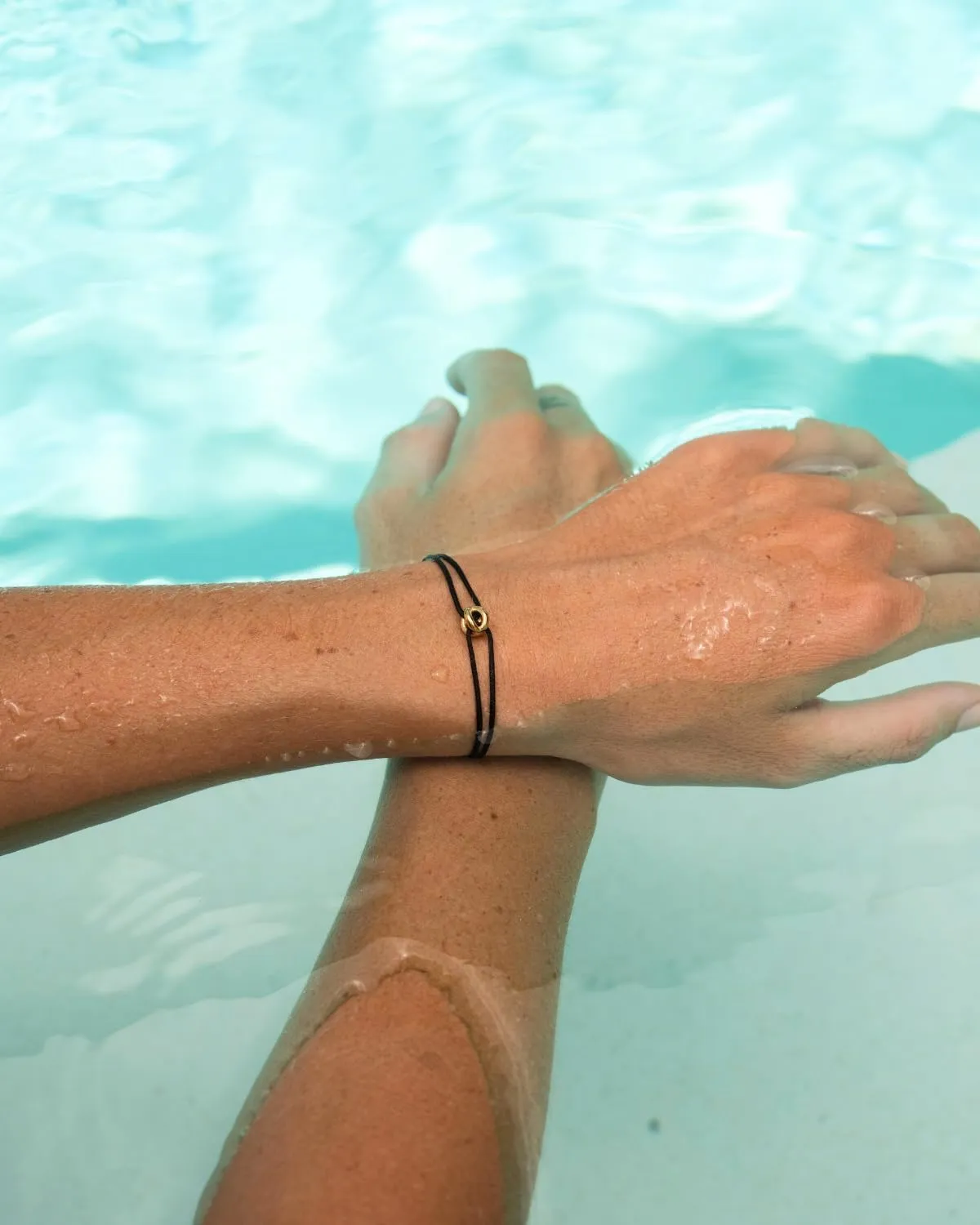Made by Nami Adjustable String Bracelets for Women and Men Handmade & Waterproof Nylon Cord Bracelet for Men and Women with Stainless Steel Ring Charm