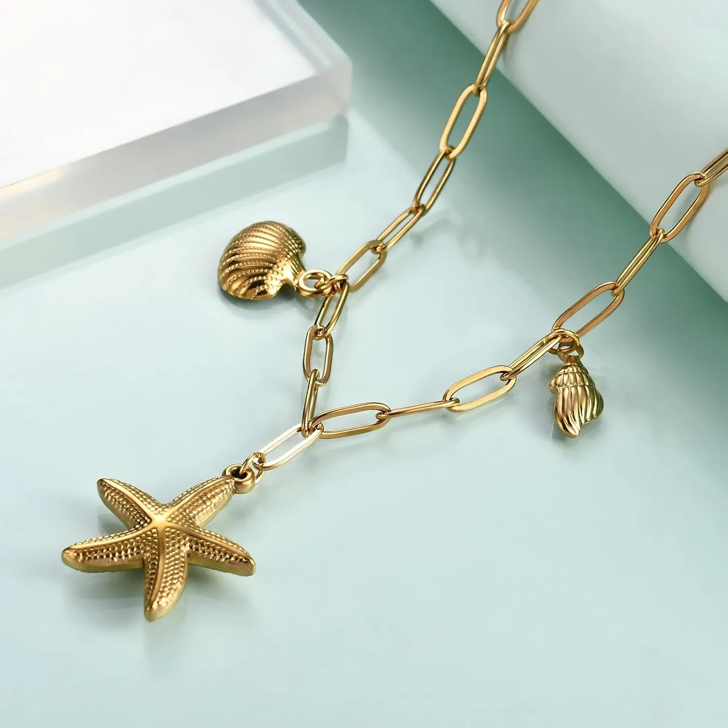 Rnivida Shell and Starfish Pendant Necklace for Women,14k Gold Plated Stainless Steel Summer Beach Jewelry Gift for Her